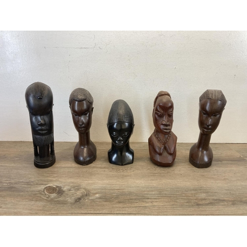 543 - Five African carved hardwood bookends