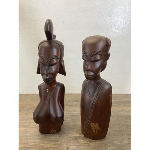 544 - Five African carved hardwood figurines - largest approx. 81cm long