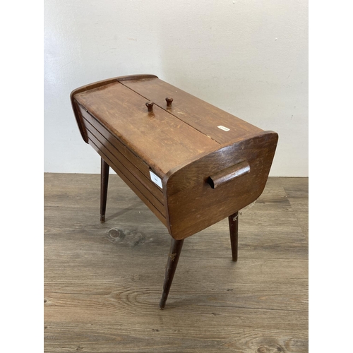 562 - A mid 20th century beech sewing box with contents - approx. 46cm high x 27cm wide x 46cm deep