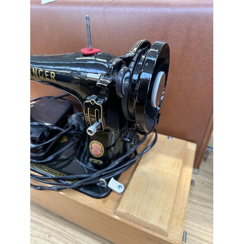 A Cased Singer 99k Electric Sewing Machine With Foot Pedal