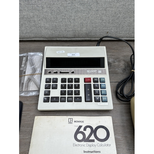 824 - Three calculators, one Monroe 620 with instruction manual, one Sharp Compet CS-1122 with instruction... 