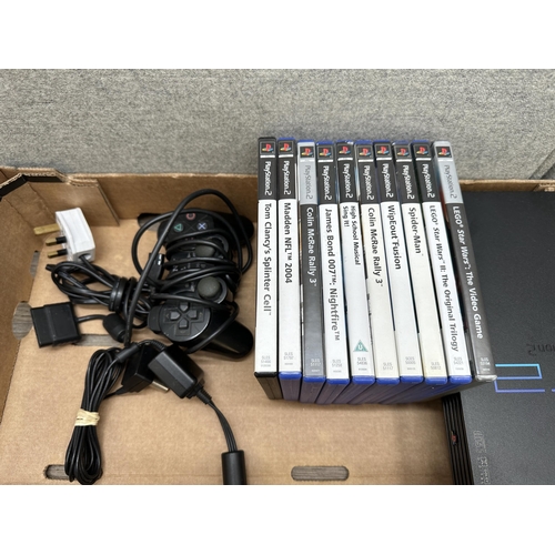 836 - A Sony PlayStation 2 with games and accessories