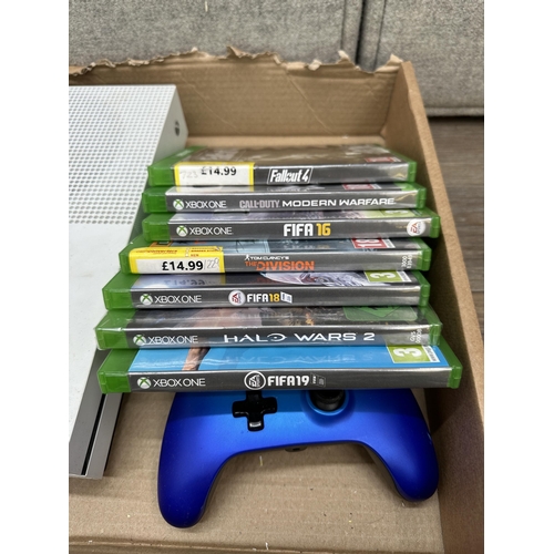 838 - A Microsoft Xbox One S with games and accessories