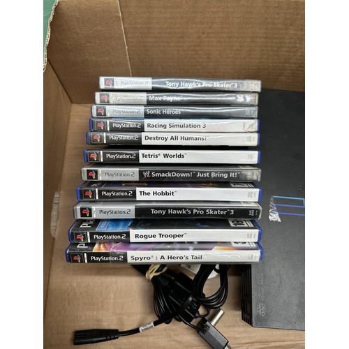 840 - A Sony PlayStation 2 with games and accessories