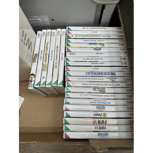 841 - A Nintendo Wii with games and accessories