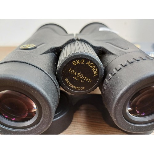 571 - A cased pair of Leupold BX-2 Acadia 10 x 50mm Field 6° waterproof binoculars with packaged as new st... 