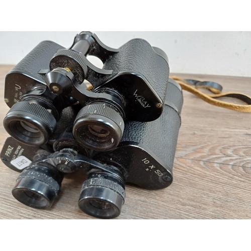 583 - Two pairs of binoculars, one Prinz 10 x 50 and one Wray Wrayvu 8 x 30