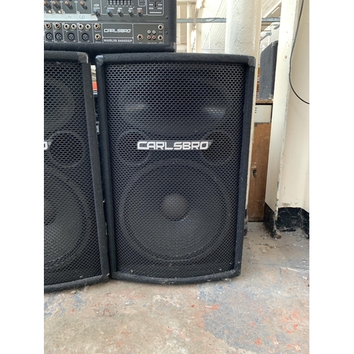 691 - A Carlsbro PA system comprising Marlin 8400DSP 400w powered mixer and a pair of D15 400w RMS 8Ω spea... 