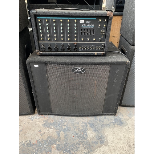 694 - A Peavey PA system comprising XR600E powered mixer, Pro-Sub subwoofer and a pair Pro-15 top speakers... 