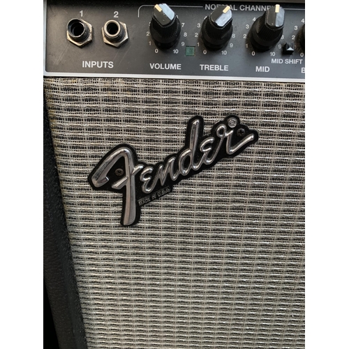 703 - A Fender Stage 112SE two-channel electric guitar amplifier with footswitch