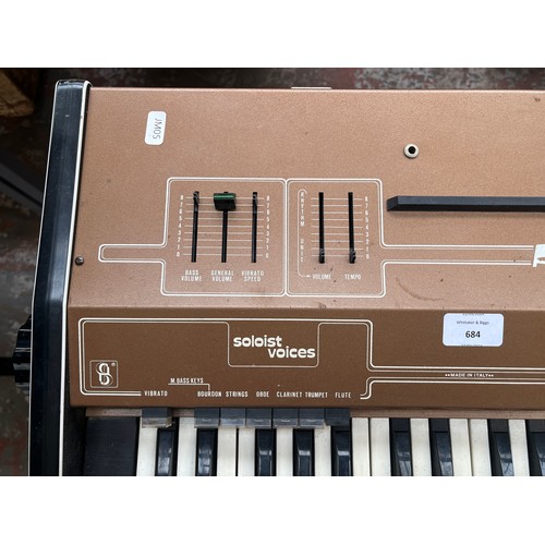 684 - A late 1970s Armon Bunny One portable electric organ with stand