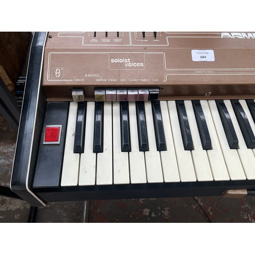 684 - A late 1970s Armon Bunny One portable electric organ with stand