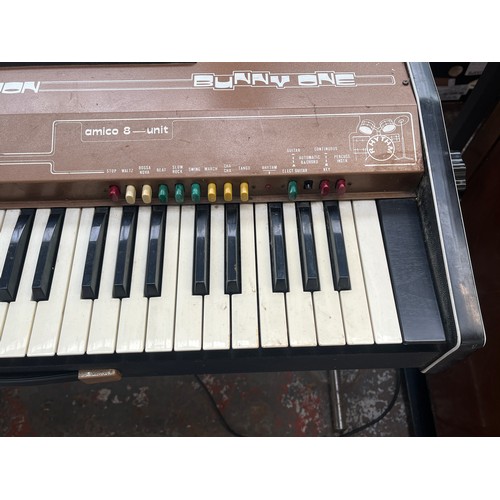 684 - A late 1970s Armon Bunny One portable electric organ with stand