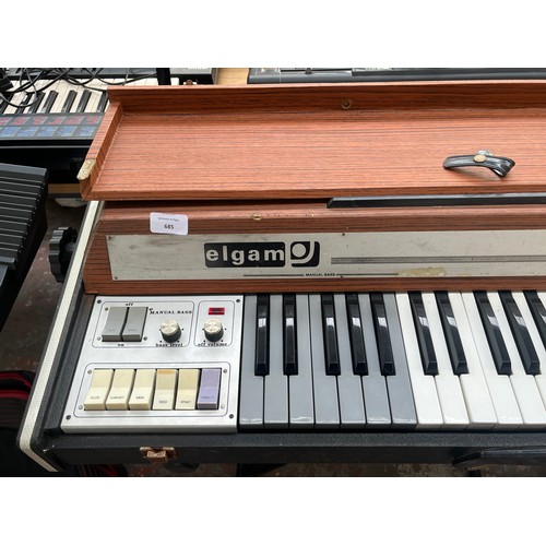 685 - A vintage Elgam Antoria Junior II electric organ with stand