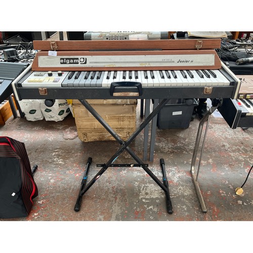 685 - A vintage Elgam Antoria Junior II electric organ with stand