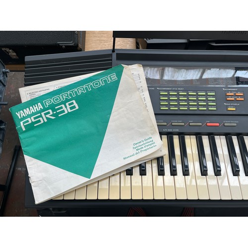 686 - A cased Yamaha PSR-38 electronic home keyboard with stand, boxed KPA-3 power supply and instruction ... 