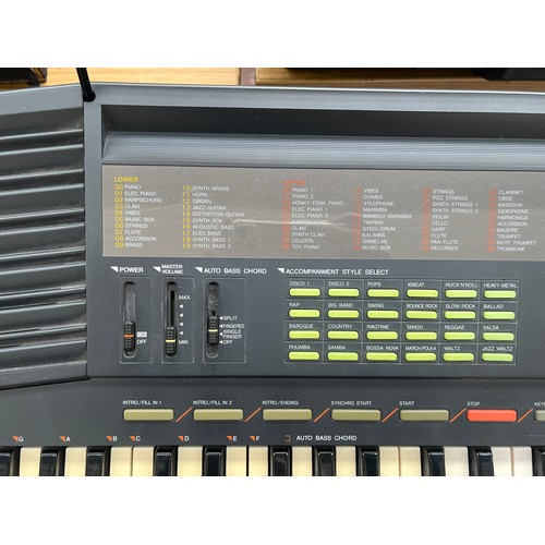 686 - A cased Yamaha PSR-38 electronic home keyboard with stand, boxed KPA-3 power supply and instruction ... 