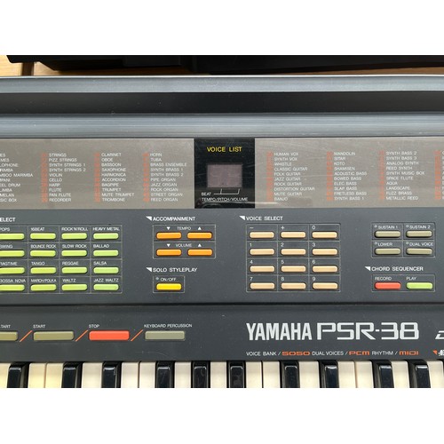 686 - A cased Yamaha PSR-38 electronic home keyboard with stand, boxed KPA-3 power supply and instruction ... 