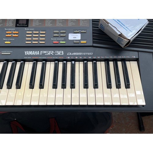 686 - A cased Yamaha PSR-38 electronic home keyboard with stand, boxed KPA-3 power supply and instruction ... 