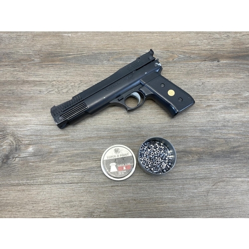 548 - A Webley Nemesis .22 Cal air pistol with pellets