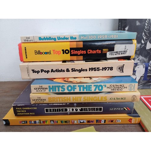 606 - A collection of music related books to include Elvis by Susie Behar hardback, The Billboard Book of ... 