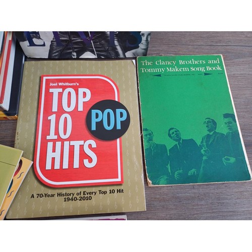 606 - A collection of music related books to include Elvis by Susie Behar hardback, The Billboard Book of ... 