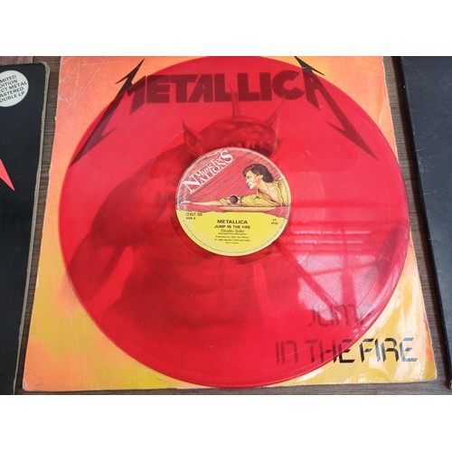 609 - A collection of rock vinyl records to include Metallica, Flotsam and Jetsam, Helloween, Megadeth, Ir... 