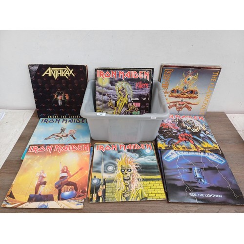 609 - A collection of rock vinyl records to include Metallica, Flotsam and Jetsam, Helloween, Megadeth, Ir... 