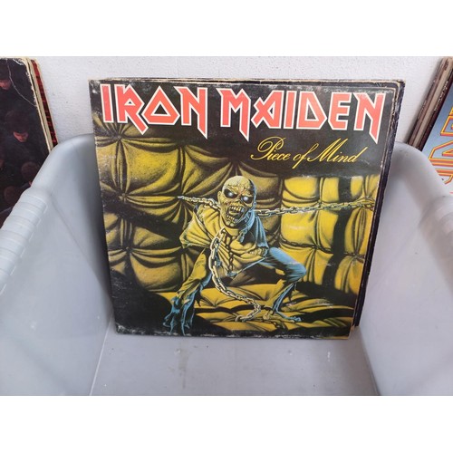 609 - A collection of rock vinyl records to include Metallica, Flotsam and Jetsam, Helloween, Megadeth, Ir... 