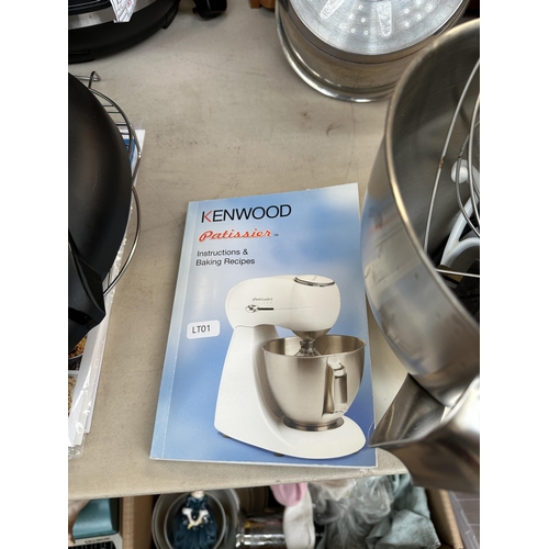 747 - A Kenwood Patissier MX270 series food mixer with bowl, attachments and instruction manual