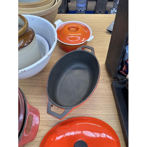 748 - A large collection of kitchenware to include Le Creuset small casserole, Molten casserole, mixing bo... 