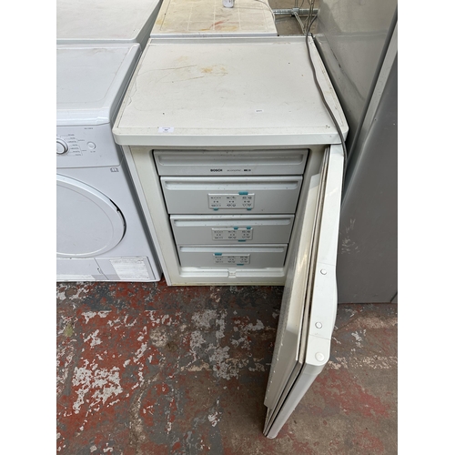 787 - A Bosch 60cm under counter freezer