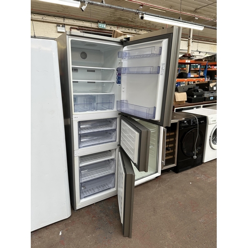 792 - A Beko CFF6873GR upright three door fridge freezer - approx. 183cm high