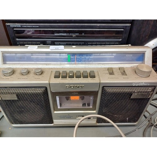 645 - Four radios, one Sony CFS-46S three-band/cassette, one Roberts R900 three-band, one Supersonic Conqu... 