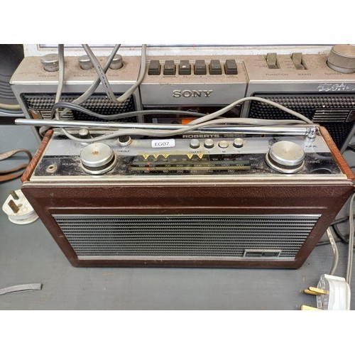 645 - Four radios, one Sony CFS-46S three-band/cassette, one Roberts R900 three-band, one Supersonic Conqu... 