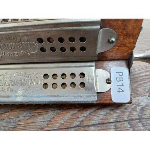 661 - A vintage three sided harmonica marked Wiemer Harmonika Concert