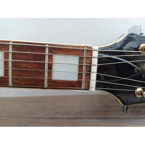 662 - A 1960s Les Paul style electric guitar with zero fret, bolt-on neck and bound neck and body