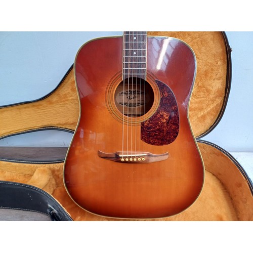 663 - A cased 1996 Fender Malibu sunburst dreadnought steel-strung acoustic guitar