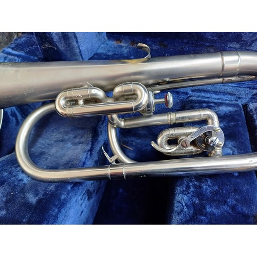 665 - A cased F.E. Olds & Son Duratone valve-rotor mellophone with mouthpiece