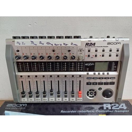 666 - A boxed Zoom R24 USB Recorder/Interface/Controller/Sampler with operation manual and packaged SanDis... 