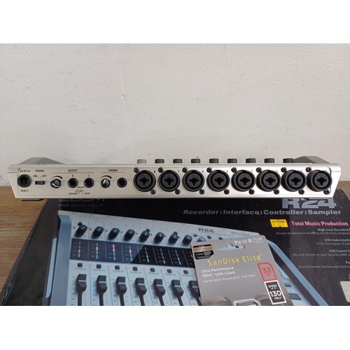 666 - A boxed Zoom R24 USB Recorder/Interface/Controller/Sampler with operation manual and packaged SanDis... 