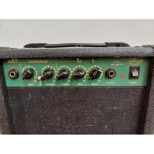 673 - A Stagg 10GAP guitar practice amplifier with guitar lead