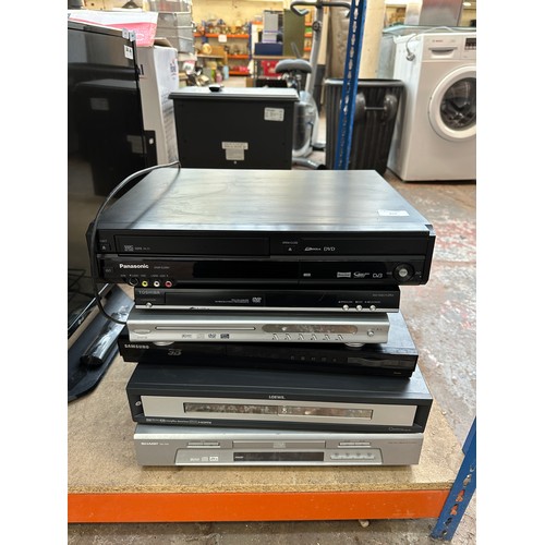 812 - Six AV items to include Samsung 3D Blu-ray player, Panasonic DMR-EZ49V VCR/DVD player, Loewe Centros... 