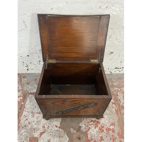 150 - An early/mid 20th century carved oak slipper box - approx. 33cm high x 40cm wide x 28cm deep