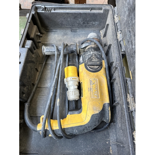 869 - Two cased DeWalt power tools, one DCD785 18v XR LI-ON cordless drill and one D25102 corded 110v SDS ... 