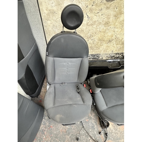 791 - A Renault Clio mk4 rear bumper together with two Fiat 500 front seats and back seat bench