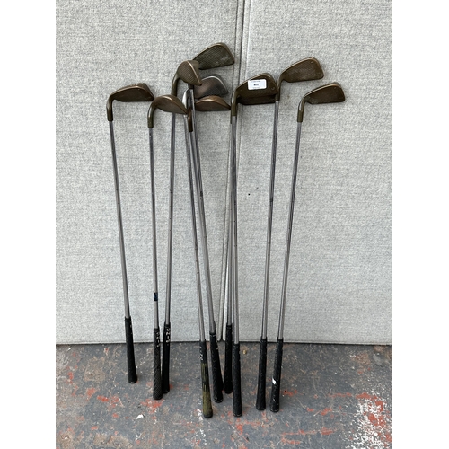 801 - A collection of Ping ISI golf clubs