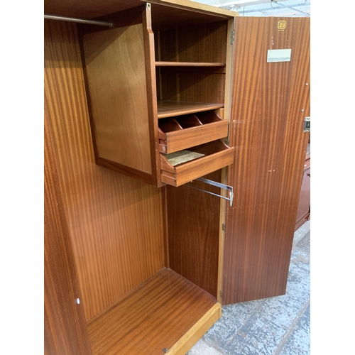 158 - A 1950s G Plan Brandon oak double wardrobe - approx.