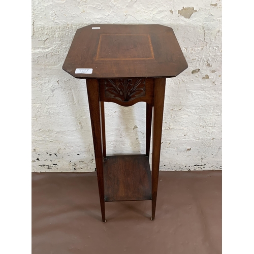 170A - An Edwardian carved and inlaid mahogany two tier jardinière stand  - approx. 98cm high x 30cm square