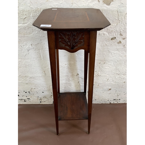 170A - An Edwardian carved and inlaid mahogany two tier jardinière stand  - approx. 98cm high x 30cm square